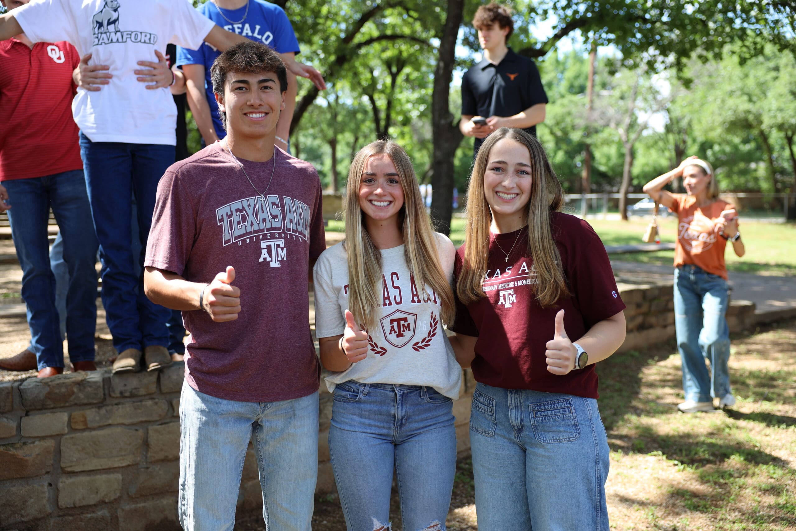 high school seniors in college tshirts